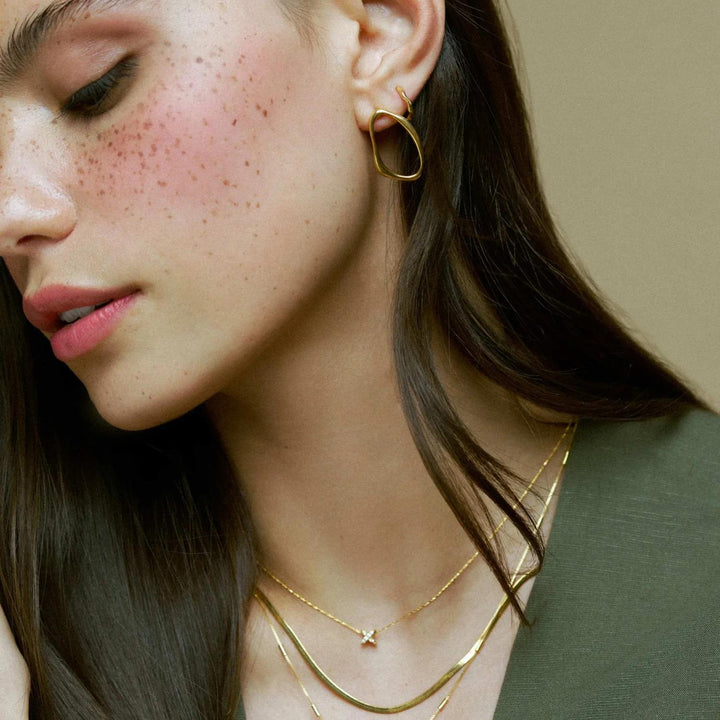 ORELIA Open organic oval stud