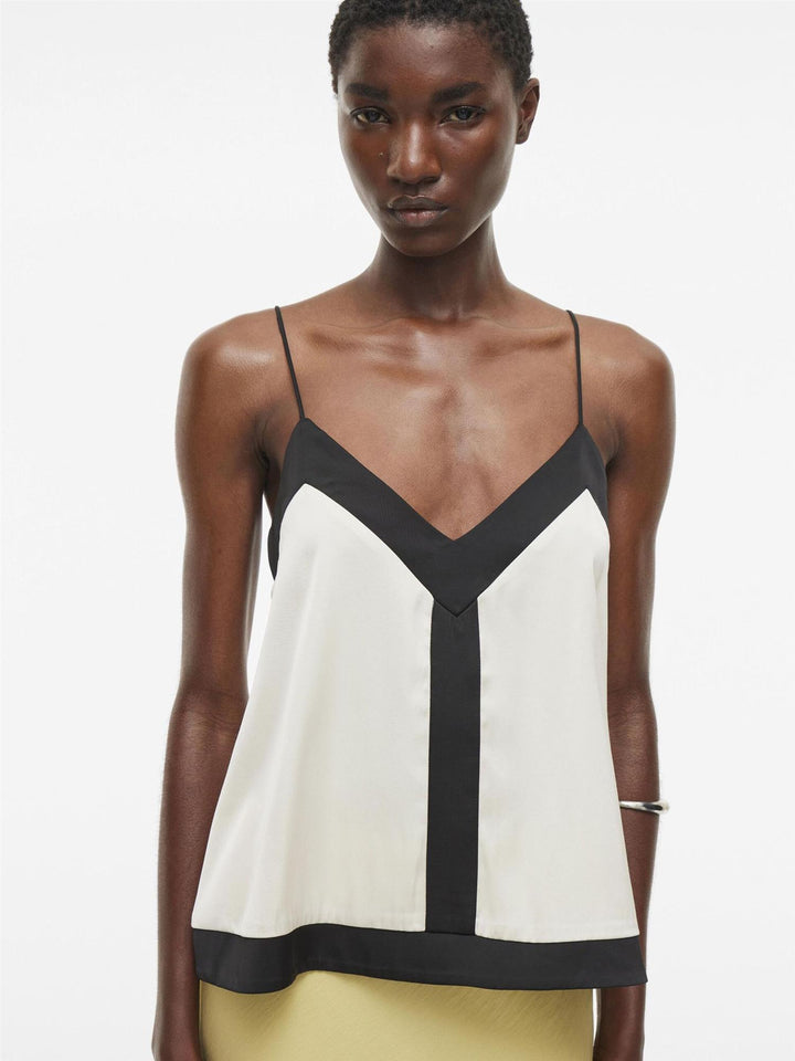 Vila Roushyra singlet